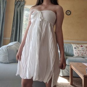 White cotton strapless tie front dress